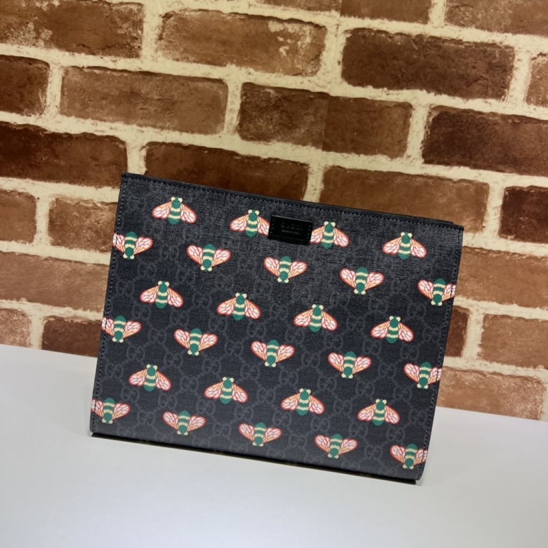 G*u*i clutch bags